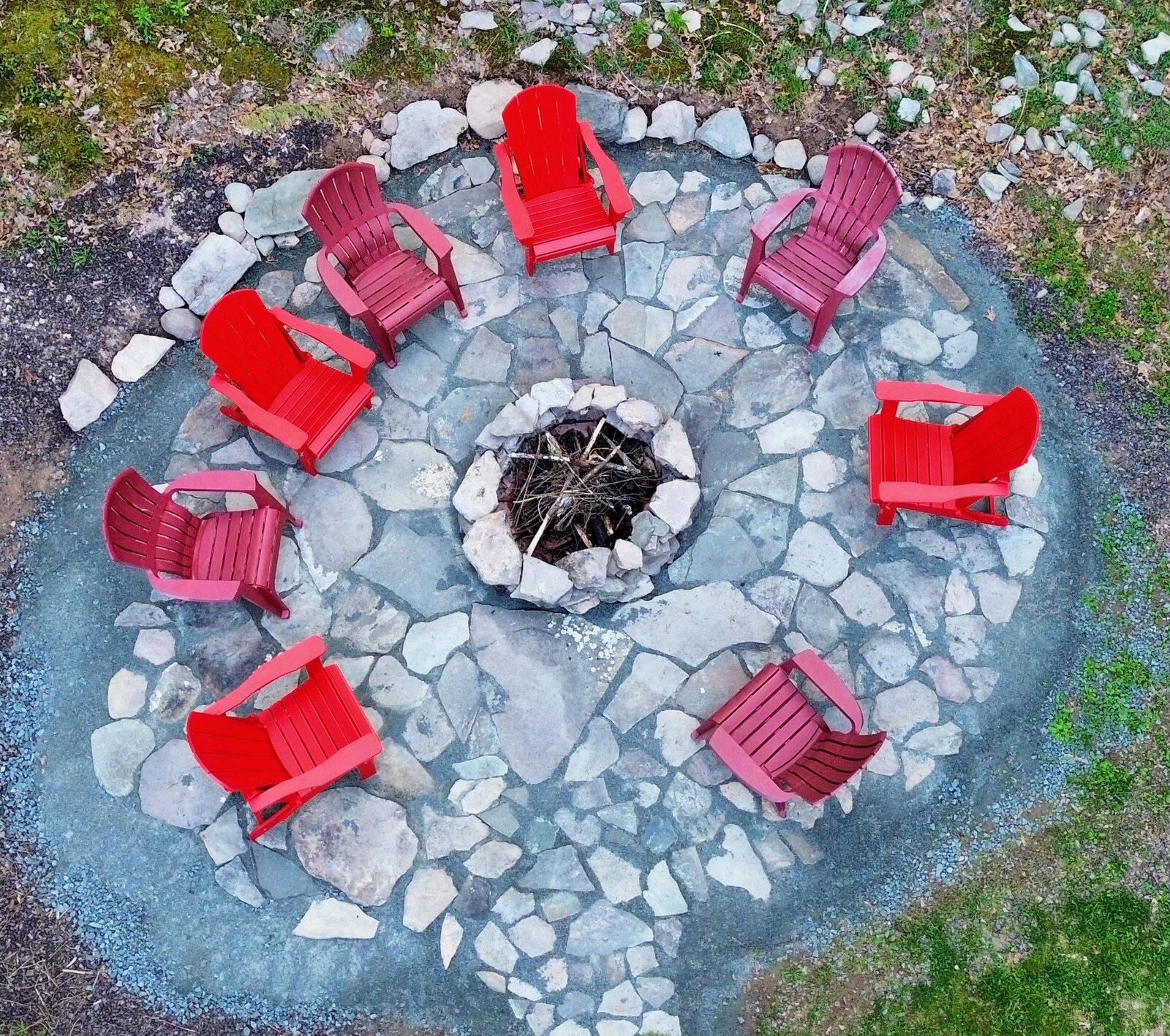 Aerial view of fire pit with Adirondack chairs